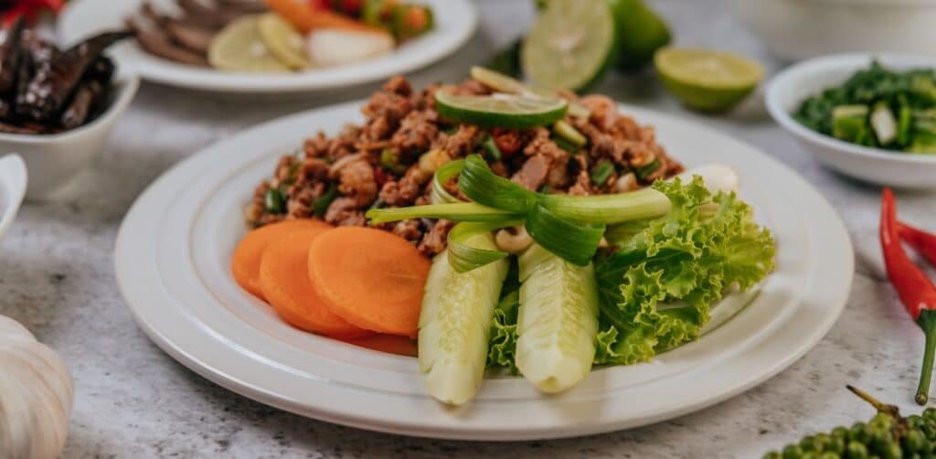 Balanced metabolic plate with 50% greens and 25% black eyed peas.