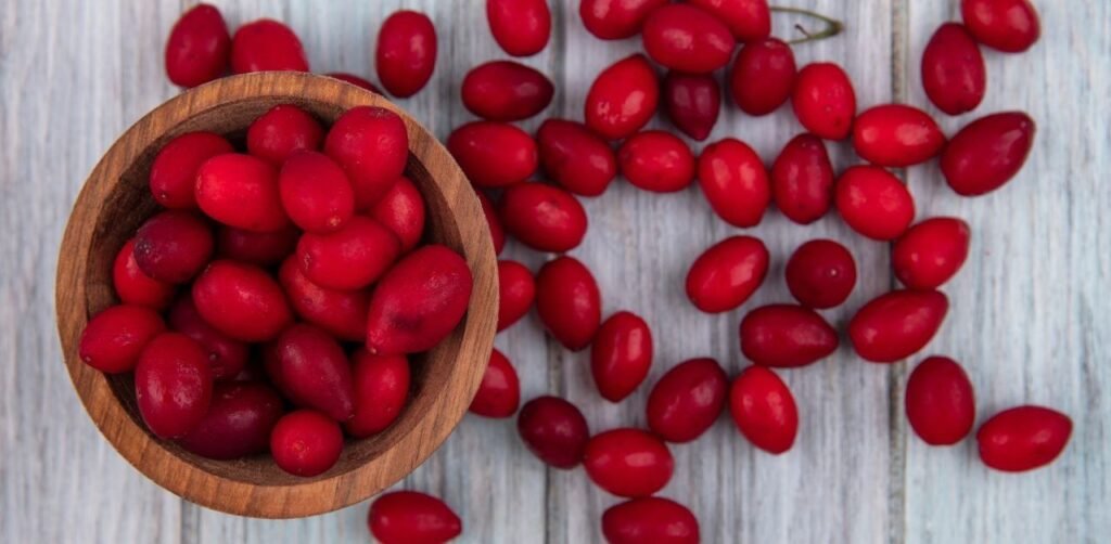 Berberine supplement capsules and natural barberry plant source.